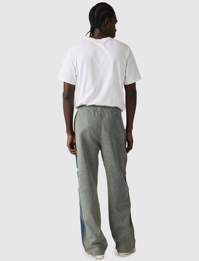 DENIM TEARS TRACK PANTS