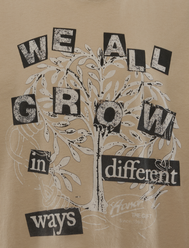 WE ALL GROW TEE